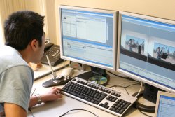 Student in front of screens